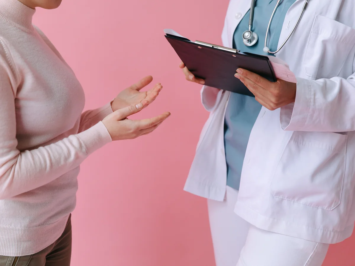Clinician conducting an annual physical exam