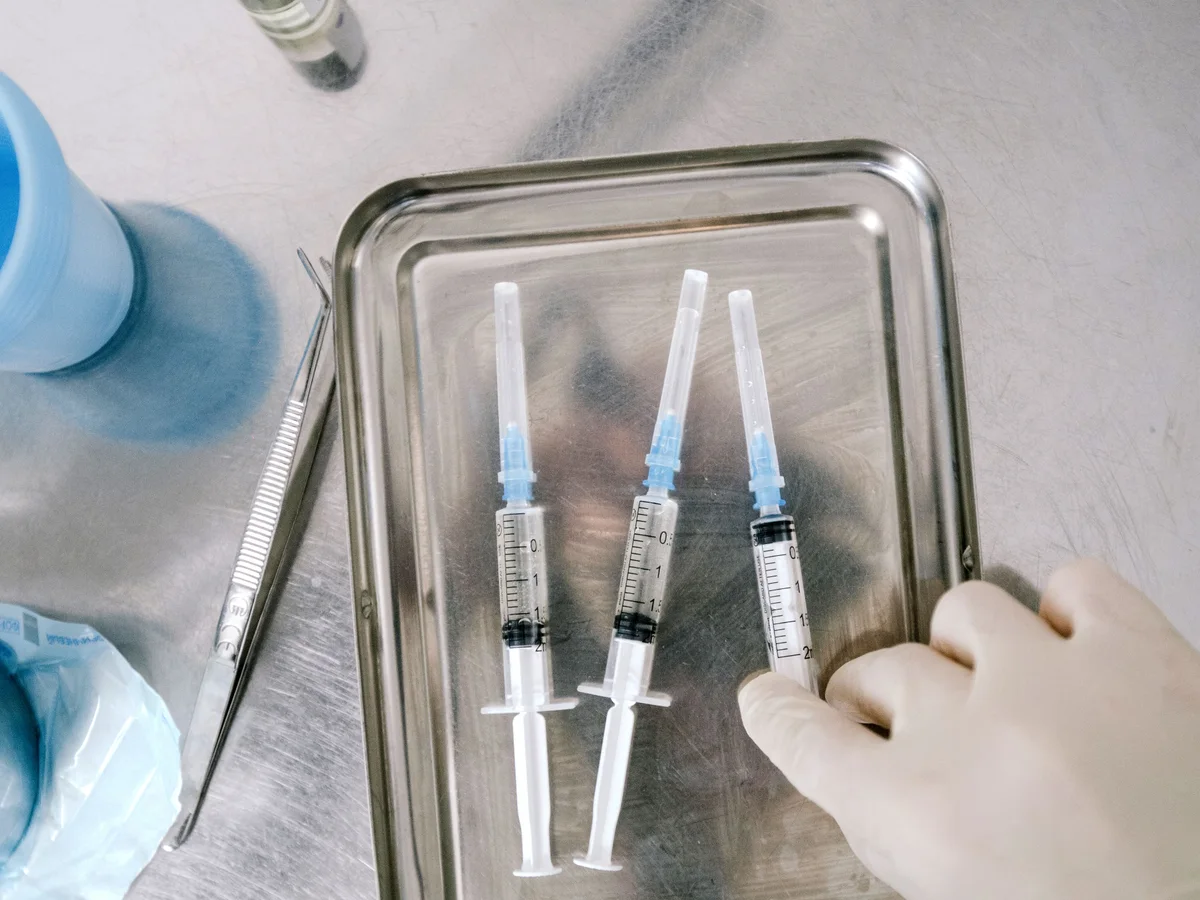 Healthcare professional performing a diagnostic test