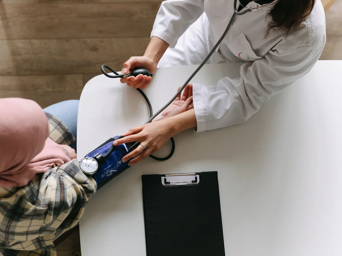 Clinician supporting a patient with diabetes management