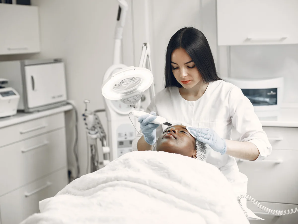 Client receiving a rejuvenating facial treatment