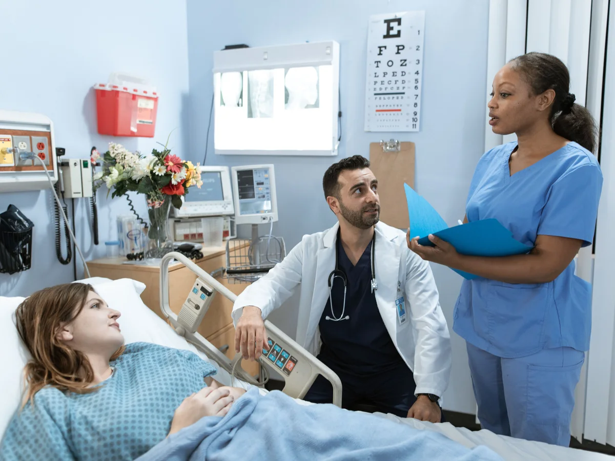 Clinician discussing screening and test results