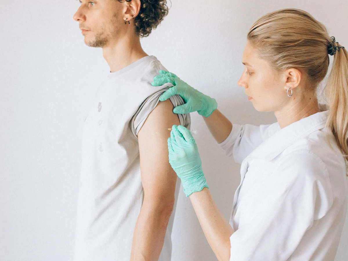 Clinician preparing a vaccine