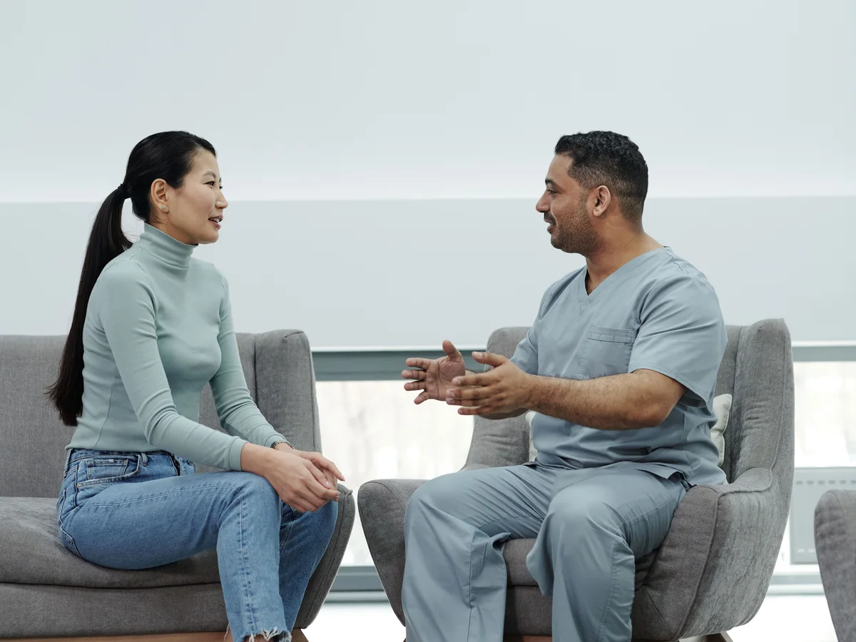 Woman meeting with a healthcare professional